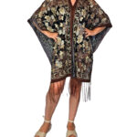 Blusa poncho de brillo con flecos